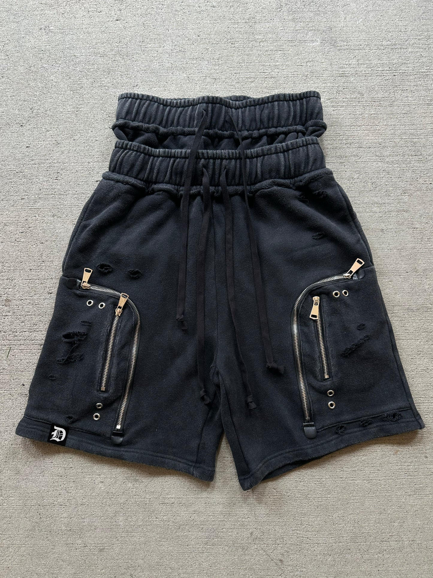 DISTRESSED ZIP PLUS SHORTS